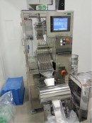 Qualicaps CWI 40 check-weigher